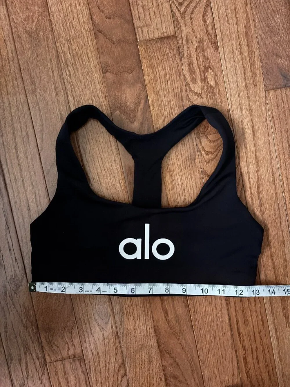 ALO Yoga Black Racerback Sports Bra with Iconic White Logo